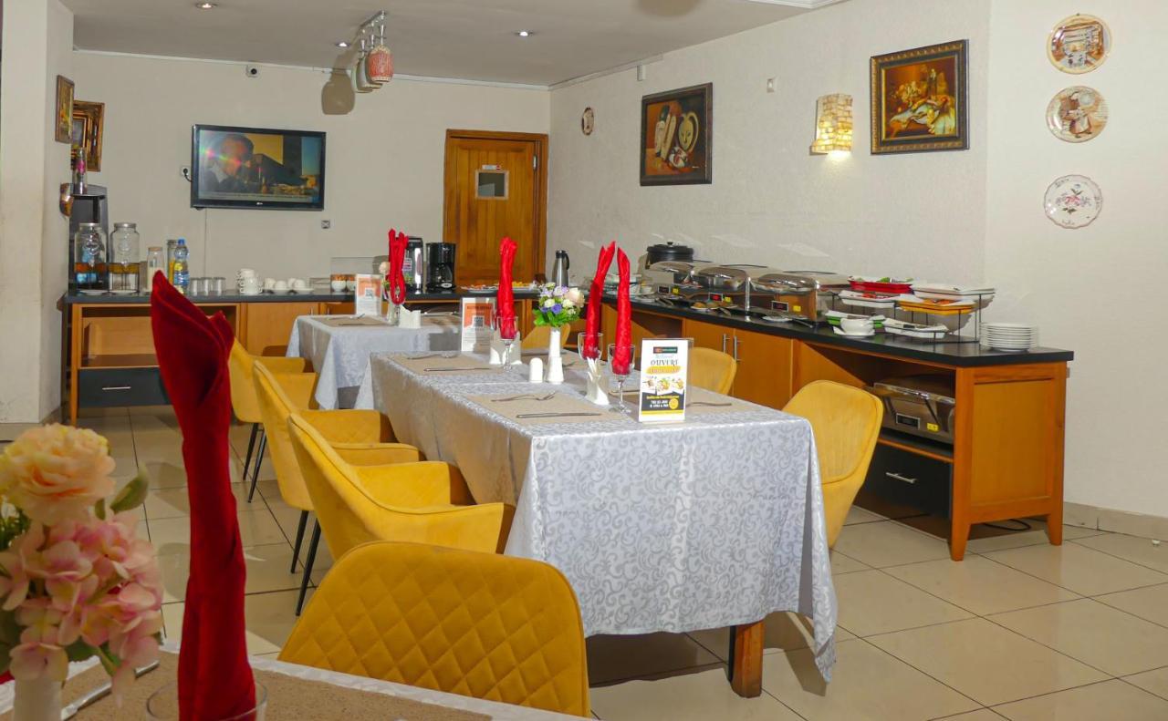 Hotel Hibiscus Louis Либревиль Экстерьер фото
